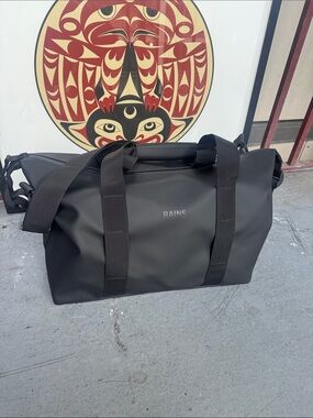 Rains Black Waterproof Duffel Bag with Shoulder Strap